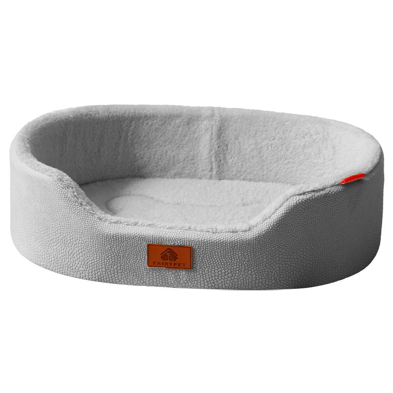 Cama de perro con cojín central desmontable y reversible mostrando sus dos texturas.